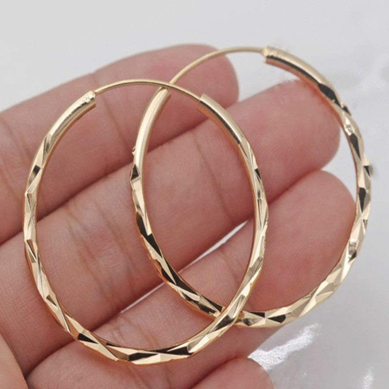 Gold hoops detail