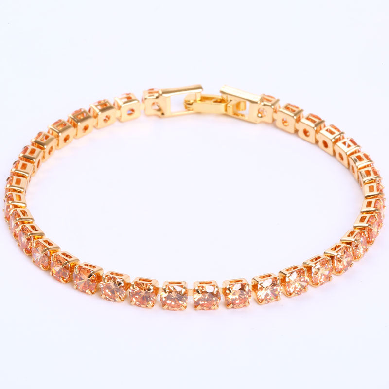 Gold tennis bracelet detail