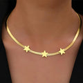 The Star Choker gold snake chain with star charms